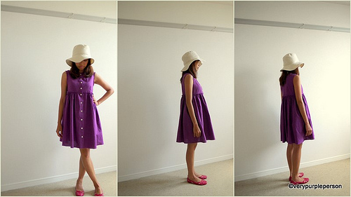 Purple dress and white hat