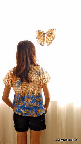 Batik top with bow brooch