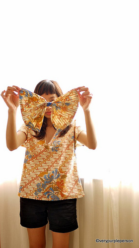 Batik top with bow brooch