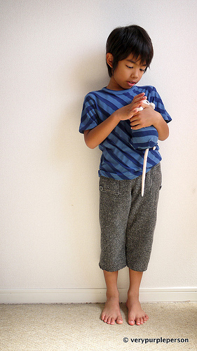 Striped T-shirt and tweed pants